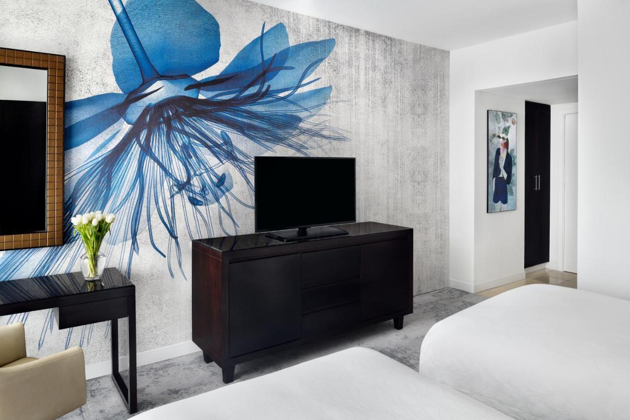 Moevenpick Hotel Jumeirah Lakes Towers Dubai Exteriör bild A guest room at the hotel